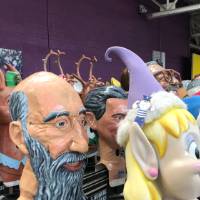 Louie hiding in parade heads